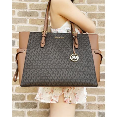 michael kors big handbags|extra large michael kors tote.